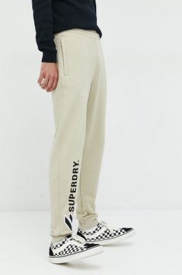 Imagine Superdry pantaloni de trening din bumbac barbati, culoarea bej, cu imprimeu